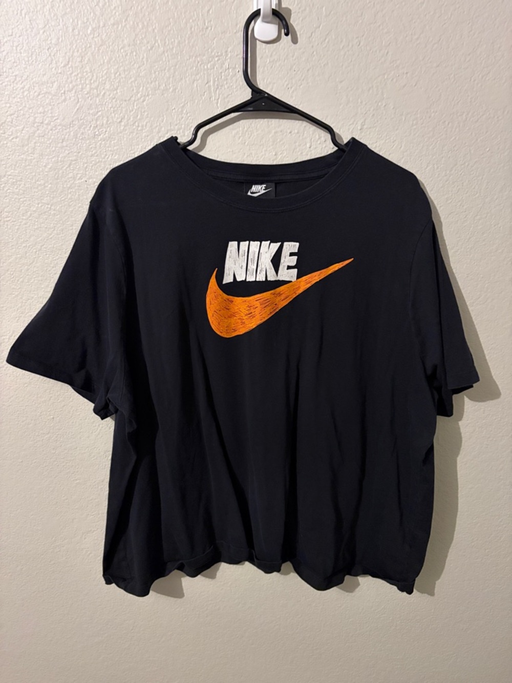 Nike Black Tee with Orange Swoosh and White Logo